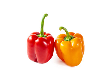 Fresh juicy shiny red and orange bell peppers.