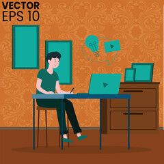 A man doing working on computer and laptop while sitting on chair.