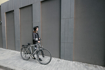 Woman riding a bicycle in a city
