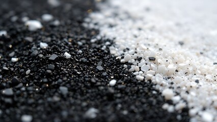Close-up of contrasting black and white granules background 