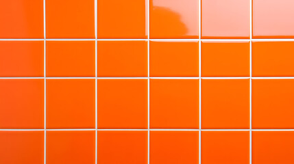Close-up of vibrant orange square tiles, creating a modern and striking textured background with bright grout lines. Minimalist and eye-catching design.