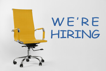 We Are Hiring. Empty office chair on light background. Recruitment, human resources concept