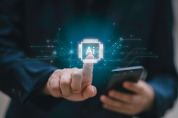 Concept for artificial intelligence, data processing, automation, innovation, and digital transformation.Businessman working with AI chip interface and big data flow structure.