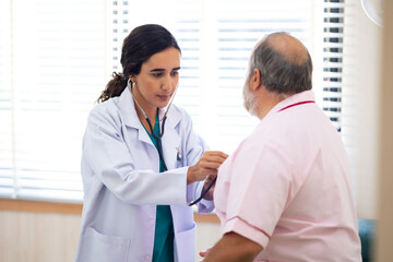 check up : Hispanic female nutritionist giving checking up to fat man stroke patient, Preventive...