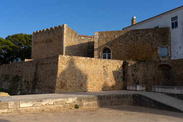 Castle of Lagos in the Algarve region of Portugal at sunset.