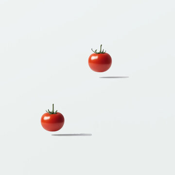 Red tomatoes on white