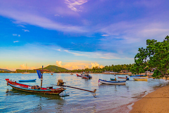Longtail boats from fishermen on the beach Koh Samui Thailand.