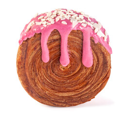 Creme-filled circular croissants (summer berries) with filling and pink strawberries glaze. Round French or New-York Roll croissants isolated on white background