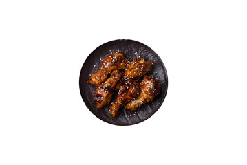 Grilled chicken wings in teriyaki sauce. Hot spicy takeaway food