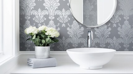Elegant gray and white damask wallpaper in a modern bathroom.