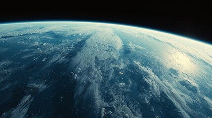 Fototapeta premium The curve of the earth seen from high above, the atmosphere a thin blue line against the blackness of space. Continents and oceans are visible far below, with clouds drifting across the surface. The i