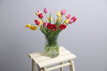 Bouquet of beautiful tulips on table indoors