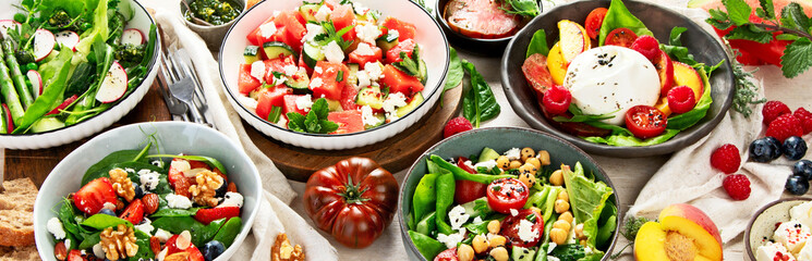 Different kinds of summer salads. Healthy lifestyle.