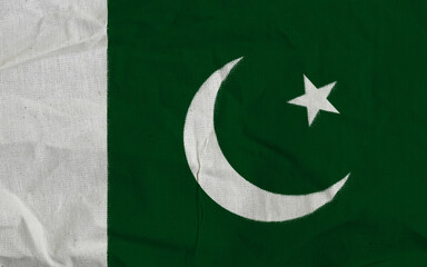Close-Up of Pakistan National Flag with Crescent and Star Symbols
