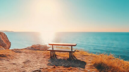 Bench Overlooking Calm Sea at Sunset Offering Tranquil Coastal Views
