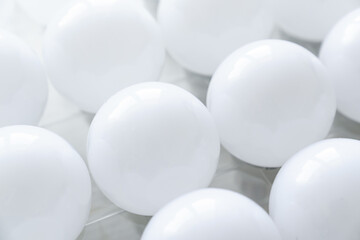 round white LED light bulb. many modern light bulbs on a white