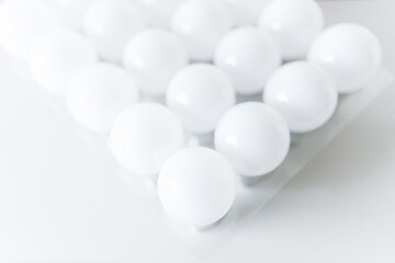 round white LED light bulb. many modern light bulbs on a white table