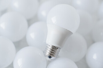 round white LED light bulb. many modern light bulbs on a white