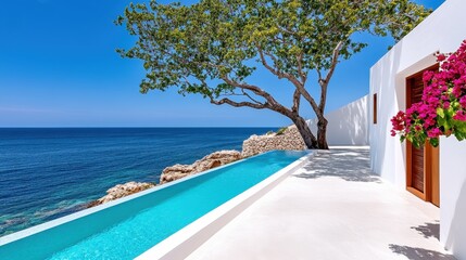 Obraz premium Luxury Oceanfront Villa with Infinity Pool and Lush Greenery