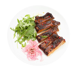 Delicious pork ribs, arugula and onion isolated on white, top view
