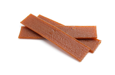 Pieces of delicious fruit leather on white background
