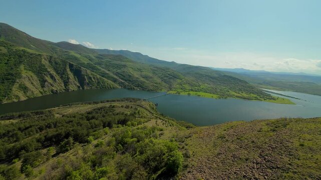 Drone view of the ancient Monyak fortress located on a hill near Kardzhali, Bulgaria. Panoramic view of the ancient Monyak fortress located on a hill on the shore of the dam Studen Kladenets near Kard