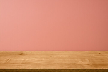 Empty wooden table top and color pink wall background for showing products and advertisers. Template mock up for display of product. product promotion in the wall. for display or montage.
