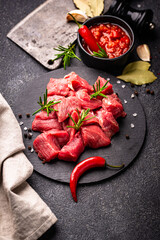 Raw beef meat and ingredients for cooking