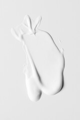 A sample of a white cosmetic moisturizer or anti-aging cream
