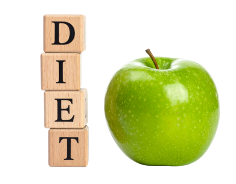 Wooden blocks spelling "DIET" are stacked beside a fresh green apple.