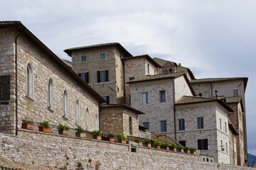 Ancient Stone Buildings Under Cloudy Sky
