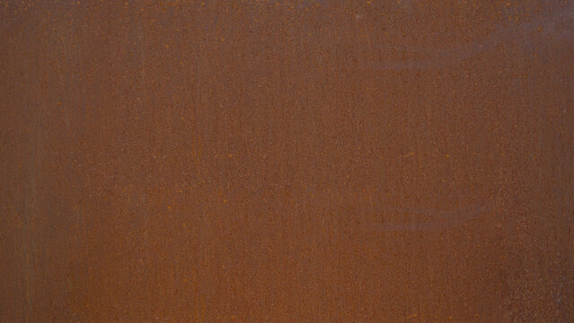 Grunge rusty orange brown metal corten steel rust stone background texture banner