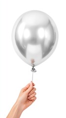 Silver Balloon Held by Hand