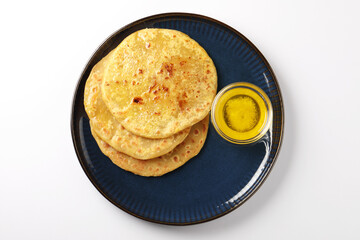 Puran Poli is an Indian sweet flatbread stuffed with chana dal, jaggery, ghee and cardamom and is usually eaten at Holi or Gudi Padva festival. Healthy sweet dessert.
