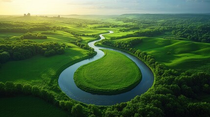 Lush green valley with a winding river meandering through.