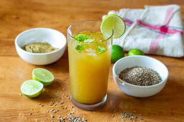 Jal Jeera is a tangy, spicy Indian beverage made with cumin, mint, lemon, and black salt, known for its refreshing and digestive properties.