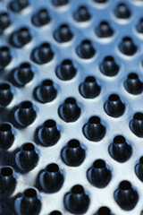 close - up of a metal grater textured background