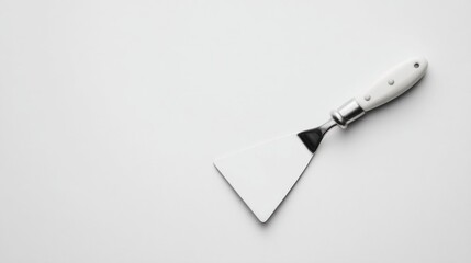 White painting spatula on white background