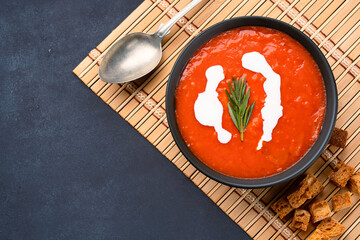 Homemade tomato soup on vintage table
