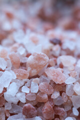 himalayan pink salt crystals as background, closeup