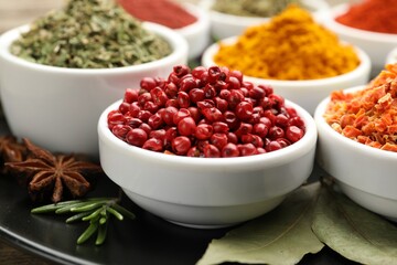 Many different aromatic spices on table, closeup
