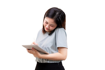 A woman multitasking by talking on the phone while writing on a tablet with a stylus.