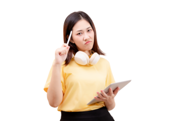 A young woman in a yellow shirt holds a tablet and pen, wearing headphones around her neck, with a thoughtful expression.