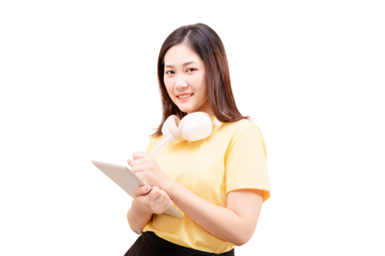 Young woman with headphones around her neck holding a tablet and smiling. - Powered by Adobe