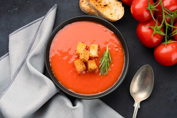 Homemade tomato soup on vintage table
