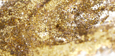 Glittery gold star confetti background. Perfect for holidays, celebrations, and luxury branding.