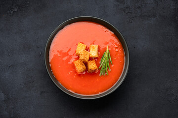 Homemade tomato soup on vintage table
