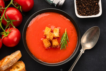 Homemade tomato soup on vintage table
