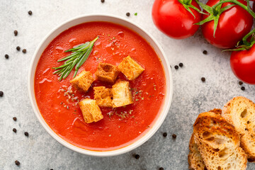 Homemade tomato soup on vintage table