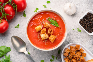 Homemade tomato soup on vintage table